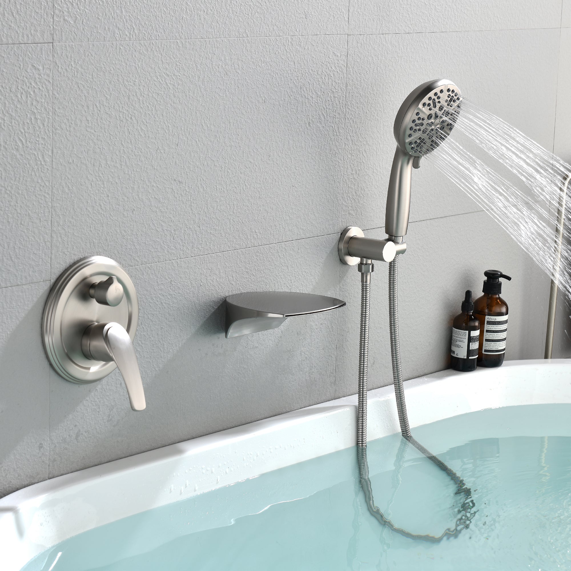 Single-Handle Wall Mount Roman Tub Faucet with Round Hand Shower