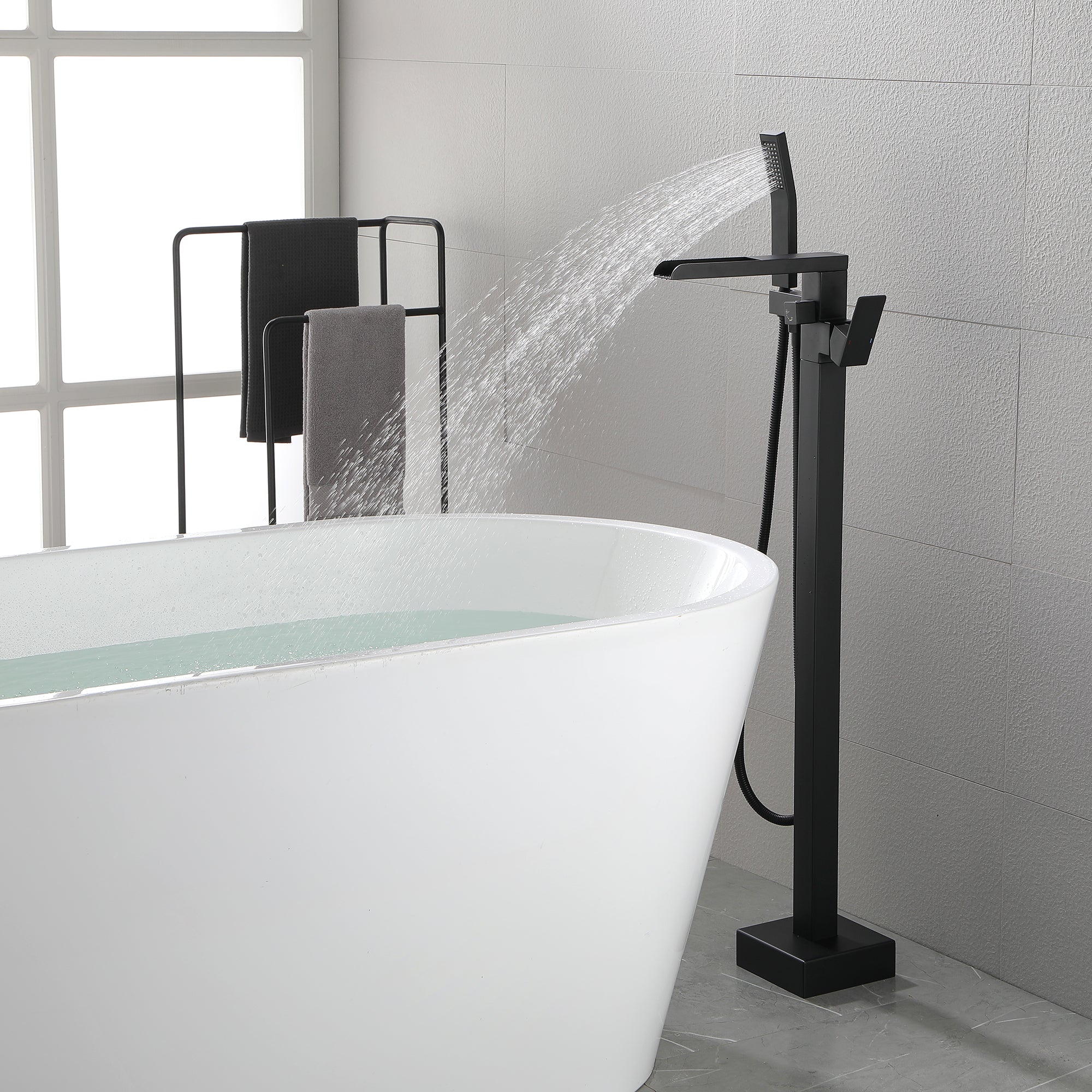 Waterfall Freestanding Single Handle Freestanding Tub Faucet with Handshower